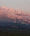 The Turów thermal power plant in Bogatynia, Poland, viewed from Germany. The power plant is seen active with smoke coming out.